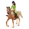A toy horse and rider figurine. Voir les images du produit