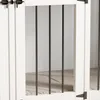 A close-up view of a white dog crate with black metal bars and hardware. Produktbild-Vorschau
