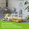 Cleaning supplies and ingredients are arranged on a kitchen sink. Produktbild-Vorschau