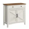 A white and brown sideboard with two doors and a drawer, shown against a white background. Produktbild-Vorschau