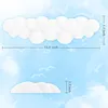 A white cloud-shaped wrist rest is shown against a light blue background with illustrations of birds and clouds. Podgląd zdjęcia produktu
