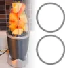 A blender cup filled with fruit and two replacement sealing rings. Náhľad obrázku produktu