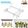 A collage of images showing a glass bottle cutter, a chandelier made of bottles, and various glass bottles and glasses. Anteprima dell’immagine prodotto