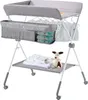 A baby changing station with storage and accessories. Voir les images du produit