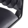 A close-up view of a gray velvet chair with a braided backrest and black metal legs. Voir les images du produit