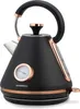 A black electric kettle with copper accents and a built-in thermometer, shown on a white background. Voir les images du produit