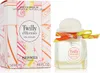 A perfume bottle and its packaging are displayed side-by-side against a white background. Anteprima dell’immagine prodotto