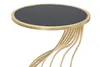 A close-up studio shot of a round side table with a black top and a gold, twisted metal base. Anteprima dell’immagine prodotto