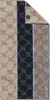 A folded towel with a patterned design. Produktbild-Vorschau