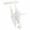 A white retractable clothesline with white fabric hanging from it, held by wooden clothespins. Náhled obrázku produktu