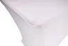 A close-up view of a white stretch tablecloth draped over a table corner. Produktbild-Vorschau