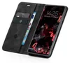 A black flip-style phone case with a phone inside showing the lock screen. Produktbild-Vorschau