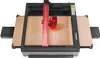 A top-down view of a laser engraving machine with a wooden platform. Produktbild-Vorschau