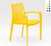 A yellow plastic chair with an open, web-like design on a white background. Produktbild-Vorschau