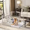 A golden retriever dog is inside a clear acrylic playpen in a living room. Anteprima dell’immagine prodotto