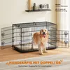 A golden retriever dog stands inside a black wire dog crate with its doors open. Produktbild-Vorschau