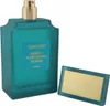 Geöffneter türkisfarbener Flakon Tom Ford Neroli Portofino Acqua mit glänzendem goldfarbenem Sprühkopf, daneben liegende flache Kappe mit eingelegter goldener Plakette. Produktbild-Vorschau