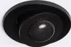A black motion sensor with a dome-shaped lens is shown against a white background. Produktbild-Vorschau