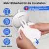 A person is holding a white shower footrest with suction cups. Produktbild-Vorschau