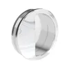A round, silver-colored handle with a textured insert, shown against a white background. Produktbild-Vorschau