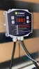 A close-up shot of a Dymbox temperature controller mounted on a wall. Náhled obrázku produktu