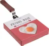 A product box for a heart-shaped frying pan, with a picture of a fried egg in the shape of a heart on the front. Náhľad obrázku produktu