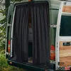 The back of a van with black curtains installed in the open rear doors. Anteprima dell’immagine prodotto