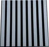 A close-up view of acoustic wall panels with vertical gray slats against a black background. Anteprima dell’immagine prodotto