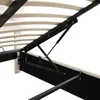A close-up view of the internal mechanism of a bed frame, showing the hydraulic lift system and wooden slats. Anteprima dell’immagine prodotto