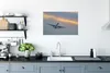 MuchoWow® Poster Flugzeug fliegt dem Sonnenuntergang Produktbild-Vorschau 3