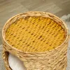 A close-up view of the top of a woven basket-like cat tree. Produktbild-Vorschau
