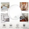 A collage of images showing different rooms in a house and icons representing product features, with a central image of a smoke detector. Produktbild-Vorschau