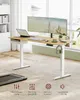 A modern home office setup with a standing desk, monitors, and a treadmill. Produktbild-Vorschau