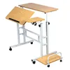 A mobile laptop table with adjustable height and tilting surface, shown against a white background. Produktbild-Vorschau