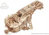 A wooden 3D puzzle model of a hurdy-gurdy on a white background. Produktbild-Vorschau