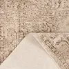 A close-up view of a rug, showing the texture and pattern. Voir les images du produit