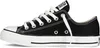 A side view of a black Converse All Star low-top sneaker with white laces and a white sole. Voir les images du produit