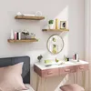 A bedroom or dressing area with shelves and a vanity table. Produktbild-Vorschau