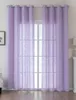 Two sheer purple curtains hanging in front of a window. Produktbild-Vorschau