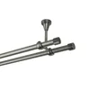 A double curtain rod system mounted to a ceiling. Anteprima dell’immagine prodotto