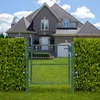 A green metal garden gate is shown in front of a large house, surrounded by green hedges and a lawn under a blue sky with white clouds. Produktbild-Vorschau
