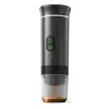 A black portable mini espresso capsule machine with a transparent lower section and a digital display on a white background. Produktbild-Vorschau