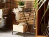 A collection of garden and home decor items arranged on a wooden slatted wall background. Produktbild-Vorschau