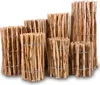 Several wooden fences of varying heights are arranged in a row against a white background. Produktbild-Vorschau