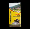 A bag of dog food with a landscape scene and puppies on the front. Produktbild-Vorschau