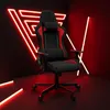 A gaming chair is shown in a dark room with red neon lights. Produktbild-Vorschau