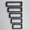 Five black rectangular frames are mounted vertically on a light gray concrete wall. Produktbild-Vorschau