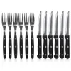 A set of steak knives and forks arranged neatly on a white background. Produktbild-Vorschau