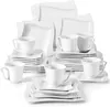 A collection of white porcelain dinnerware, including plates, cups, and saucers, arranged in stacks and sets. Náhled obrázku produktu