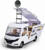 A toy camper van with its roof and rear door open, displaying the interior and accessories. Voir les images du produit